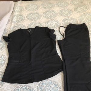 Gently worn - Scrubology scrubs set-  bottoms are medium petite, top medium